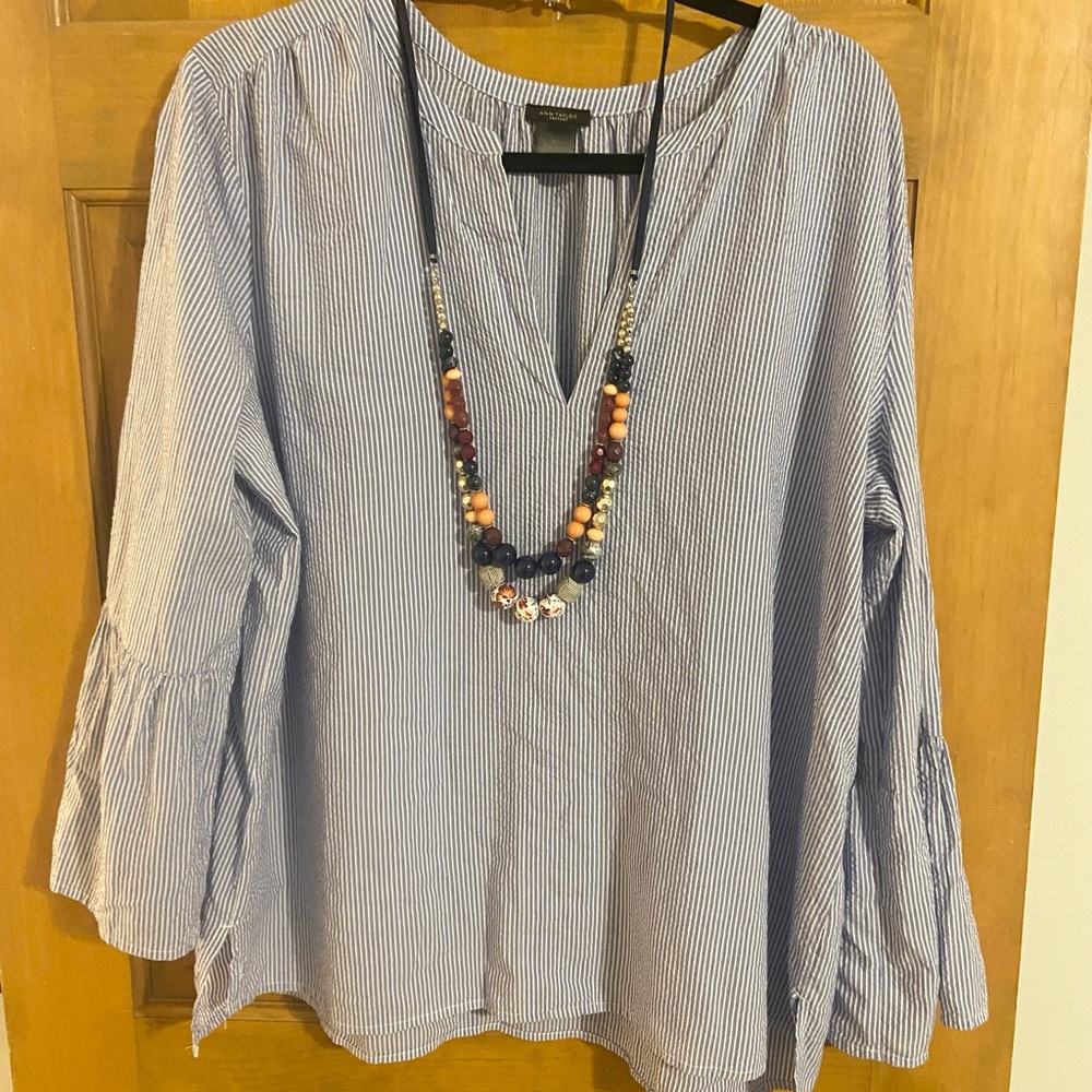 Light Blue Bell Sleeve Blouse with Ruffled Style